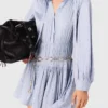 Abito camicia fluido con borchie Abito camicia fluido con borchie