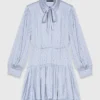 Abito camicia fluido con borchie Abito camicia fluido con borchie