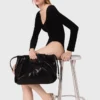 Body in velluto con dettagli a corsetto