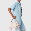 Camicia corta in denim con strass
