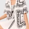 Camicia ricamata a maniche corte