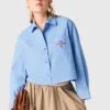 Camicia ricamata con plissettatura sul retro Camicia ricamata con plissettatura sul retro