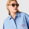 Camicia ricamata con plissettatura sul retro Camicia ricamata con plissettatura sul retro