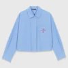 Camicia ricamata con plissettatura sul retro Camicia ricamata con plissettatura sul retro