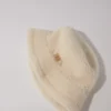 Cappello a secchiello in pelliccia sintetica