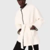 Cappotto foderato con nastro a contrasto Cappotto foderato con nastro a contrasto