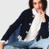 Cardigan con bottoni a fiocco gioiello