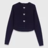 Cardigan con bottoni a fiocco gioiello