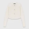 Cardigan con bottoni decorativi a fiocco