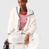 Cardigan con collo a barchetta a trecce