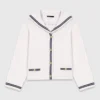 Cardigan con collo a barchetta a trecce