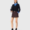 Cardigan con dettagli rimovibili Cardigan con dettagli rimovibili