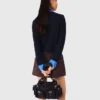 Cardigan con dettagli rimovibili Cardigan con dettagli rimovibili