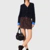 Cardigan con dettagli rimovibili Cardigan con dettagli rimovibili