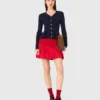 Cardigan con peplo in vita Cardigan con peplo in vita