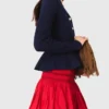 Cardigan con peplo in vita Cardigan con peplo in vita