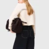Cardigan corto con impunture