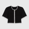 Cardigan corto con impunture Cardigan corto con impunture