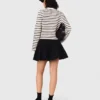 Cardigan in lana con paillettes Cardigan in lana con paillettes