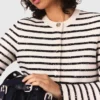 Cardigan in lana con paillettes Cardigan in lana con paillettes