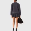 Cardigan lungo in maglia con impunture