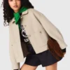 Giacca corta in lana con plissettatura sul retro Giacca corta in lana con plissettatura sul retro
