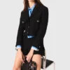 Giacca corta in tweed con strass Giacca corta in tweed con strass