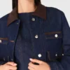 Giacca in denim con ecopelle Giacca in denim con ecopelle