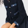 Giacca in tweed con bordi in denim Giacca in tweed con bordi in denim