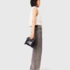 Gilet in tweed con bordi in perline