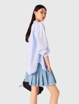 Gonna corta in denim a pieghe con strass