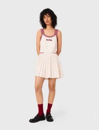 Gonna mini a pieghe in maglia