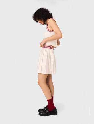 Gonna mini a pieghe in maglia