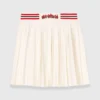 Gonna mini a pieghe in maglia Gonna mini a pieghe in maglia