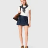Gonna-pantaloncino in denim ricamato con effetto a strati Gonna-pantaloncino in denim ricamato con effetto a strati