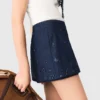Gonna-pantaloncino in denim ricamato con effetto a strati Gonna-pantaloncino in denim ricamato con effetto a strati