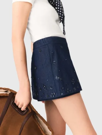 Gonna-pantaloncino in denim ricamato con effetto a strati