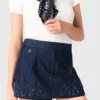 Gonna-pantaloncino in denim ricamato con effetto a strati Gonna-pantaloncino in denim ricamato con effetto a strati