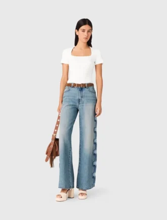 Jeans a gamba larga con ricami floreali