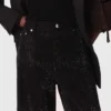 Jeans a gamba larga con strass Jeans a gamba larga con strass