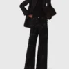 Jeans a gamba larga con strass Jeans a gamba larga con strass