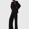 Jeans a gamba larga con strass Jeans a gamba larga con strass