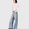 Jeans a gamba larga con strass su tutta la superficie