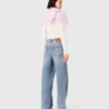 Jeans a gamba larga con strass su tutta la superficie