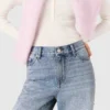 Jeans a gamba larga con strass su tutta la superficie