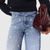 Jeans a gamba larga ricamati Jeans a gamba larga ricamati