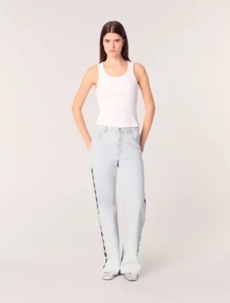 Jeans a zampa con strappi e strass