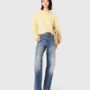 Jeans con cintura a maglie