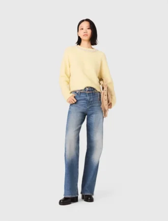 Jeans con cintura a maglie