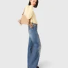 Jeans con cintura a maglie